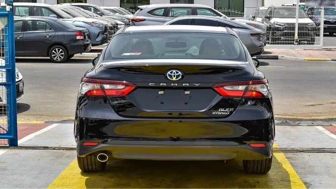 New Toyota Camry IX (XV80), 2.5 l, 2024 in Dubai by Najem Motors, Black color. GCC Specs | AUTO.AE