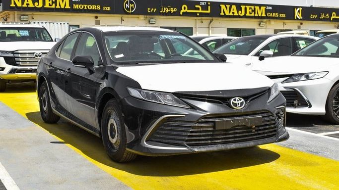 New Toyota Camry IX (XV80), 2.5 l, 2024 in Dubai by Najem Motors, Black color. GCC Specs | AUTO.AE