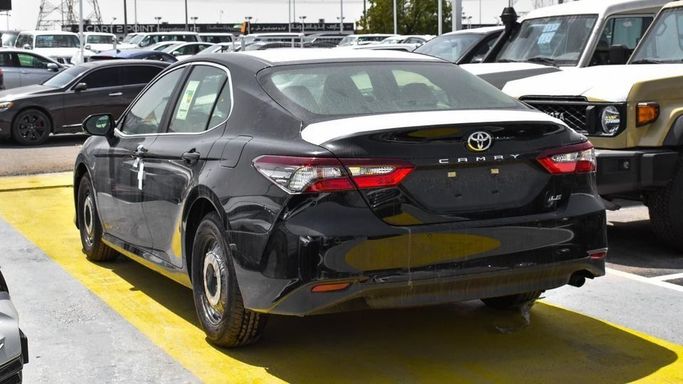 New Toyota Camry IX (XV80), 2.5 l, 2024 in Dubai by Najem Motors, Black color. GCC Specs | AUTO.AE
