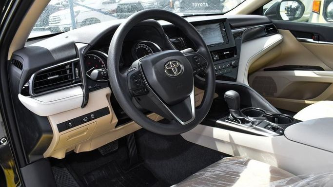 New Toyota Camry IX (XV80), 2.5 l, 2024 in Dubai by Najem Motors, Black color. GCC Specs | AUTO.AE