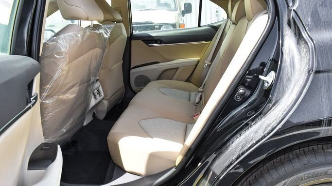 New Toyota Camry IX (XV80), 2.5 l, 2024 in Dubai by Najem Motors, Black color. GCC Specs | AUTO.AE