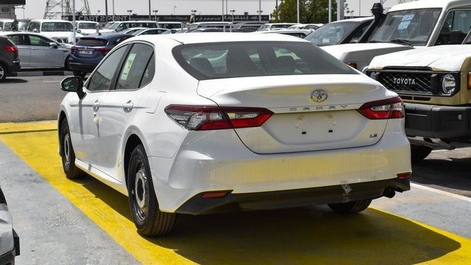 New Toyota Camry IX (XV80), 2.5 l, 2024 in Dubai by Najem Motors, White color. GCC Specs | AUTO.AE