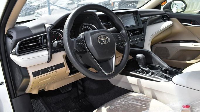 New Toyota Camry IX (XV80), 2.5 l, 2024 in Dubai by Najem Motors, White color. GCC Specs | AUTO.AE