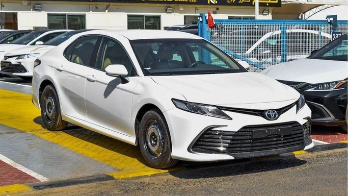 New Toyota Camry IX (XV80), 2.5 l, 2024 in Dubai by Najem Motors, White color. GCC Specs | AUTO.AE
