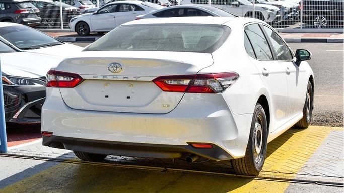 New Toyota Camry IX (XV80), 2.5 l, 2024 in Dubai by Najem Motors, White color. GCC Specs | AUTO.AE