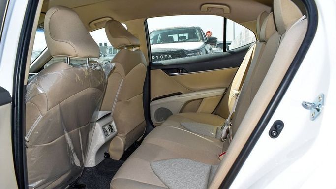 New Toyota Camry IX (XV80), 2.5 l, 2024 in Dubai by Najem Motors, White color. GCC Specs | AUTO.AE