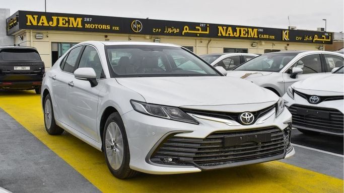 New Toyota Camry IX (XV80), 2.5 l, 2024 in Dubai by Najem Motors, White color. GCC Specs | AUTO.AE