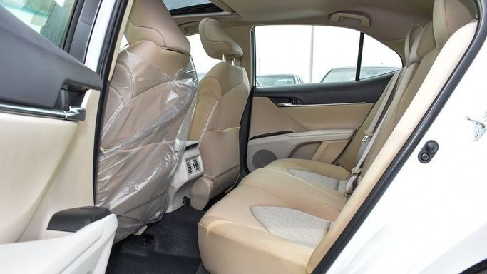 New Toyota Camry IX (XV80), 2.5 l, 2024 in Dubai by Najem Motors, White color. GCC Specs | AUTO.AE