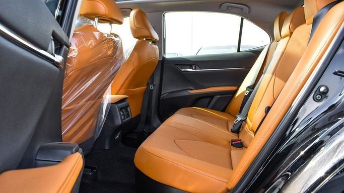 New Toyota Camry IX (XV80), 2.5 l, 2024 in Dubai by Najem Motors, Black color. GCC Specs | AUTO.AE