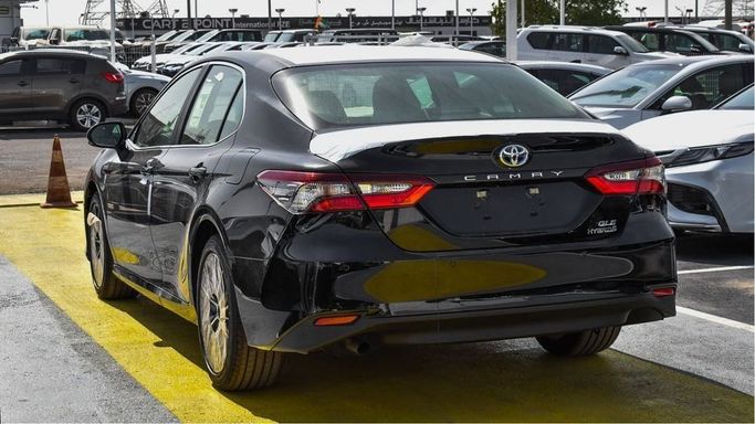 New Toyota Camry IX (XV80), 2.5 l, 2024 in Dubai by Najem Motors, Black color. GCC Specs | AUTO.AE