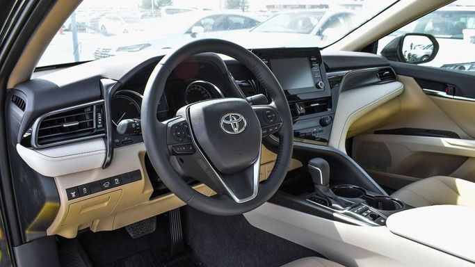 New Toyota Camry IX (XV80), 2.5 l, 2024 in Dubai by Najem Motors, Black color. GCC Specs | AUTO.AE