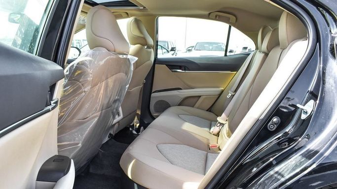 New Toyota Camry IX (XV80), 2.5 l, 2024 in Dubai by Najem Motors, Black color. GCC Specs | AUTO.AE