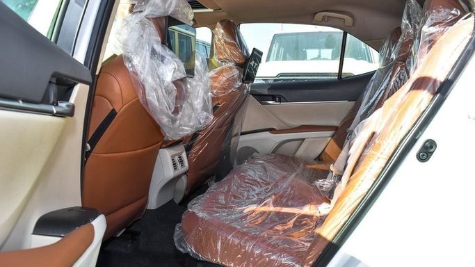 New Toyota Camry VIII (XV70) Facelift, 2.5 l, 2023 in Dubai by Najem Motors, White color. GCC Specs | AUTO.AE