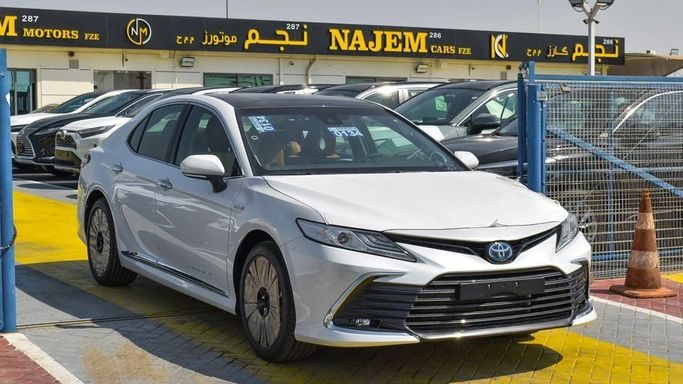 New Toyota Camry IX (XV80), 2.5 l, 2024 in Dubai by Najem Motors, White color. GCC Specs | AUTO.AE