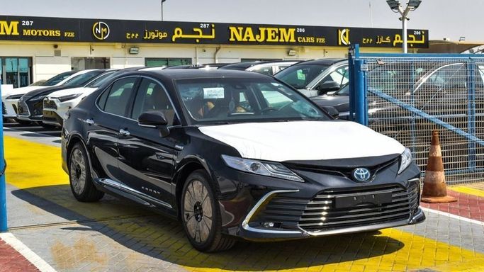 New Toyota Camry IX (XV80), 2.5 l, 2024 in Dubai by Najem Motors, Black color. GCC Specs | AUTO.AE