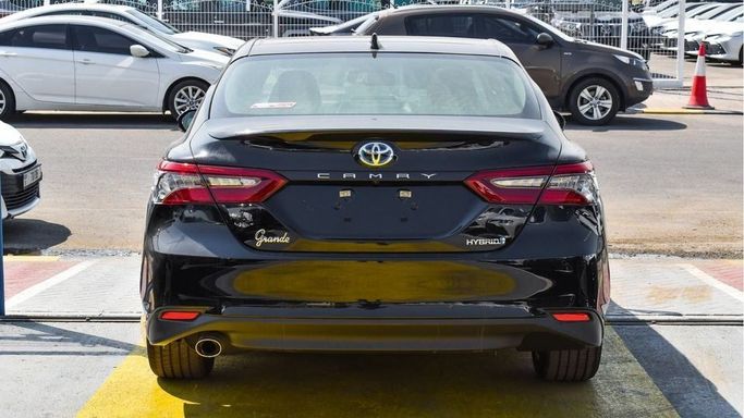 New Toyota Camry IX (XV80), 2.5 l, 2024 in Dubai by Najem Motors, Black color. GCC Specs | AUTO.AE