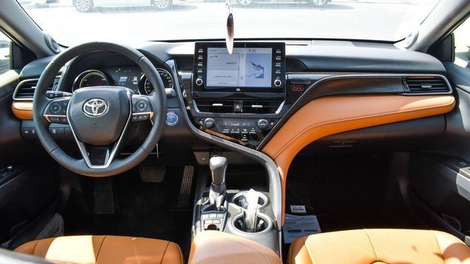 New Toyota Camry IX (XV80), 2.5 l, 2024 in Dubai by Najem Motors, Black color. GCC Specs | AUTO.AE