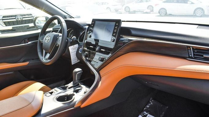 New Toyota Camry IX (XV80), 2.5 l, 2024 in Dubai by Najem Motors, Black color. GCC Specs | AUTO.AE