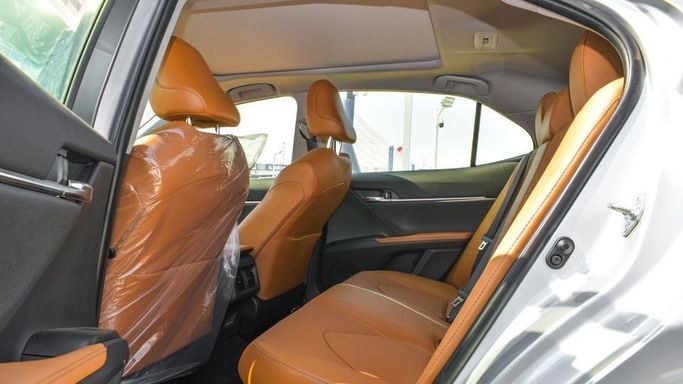 New Toyota Camry IX (XV80), 2.5 l, 2024 in Dubai by Najem Motors, Silver color. GCC Specs | AUTO.AE