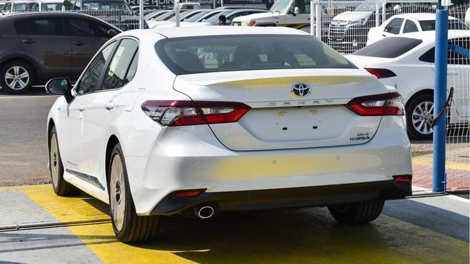 New Toyota Camry IX (XV80), 2.5 l, 2024 in Dubai by Najem Motors, White color. GCC Specs | AUTO.AE