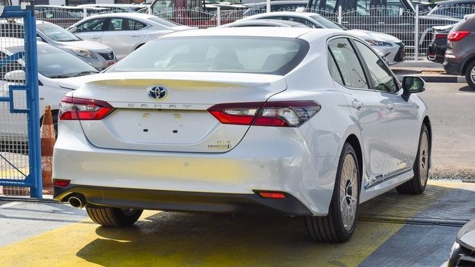 New Toyota Camry IX (XV80), 2.5 l, 2024 in Dubai by Najem Motors, White color. GCC Specs | AUTO.AE