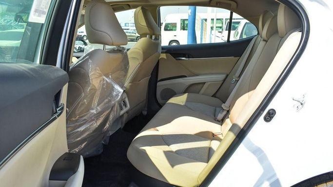 New Toyota Camry IX (XV80), 2.5 l, 2024 in Dubai by Najem Motors, White color. GCC Specs | AUTO.AE