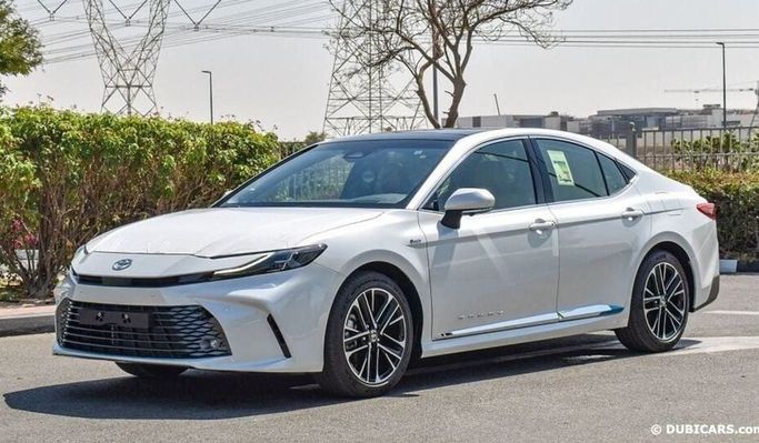 New Toyota Camry IX (XV80), 2.5 l, 2024 in Dubai by Najem Motors, White color. GCC Specs | AUTO.AE