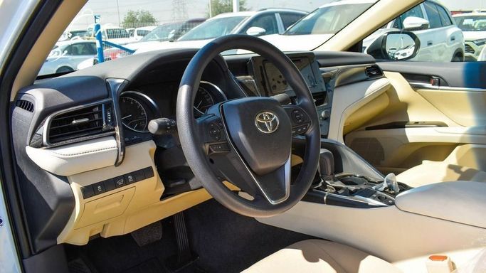 New Toyota Camry VIII (XV70) Facelift, 2.5 l, 2023 in Dubai by Najem Motors, White color. GCC Specs | AUTO.AE