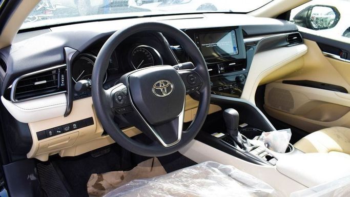 New Toyota Camry VIII (XV70) Facelift, 2.5 l, 2023 in Dubai by Najem Motors, Black color. GCC Specs | AUTO.AE
