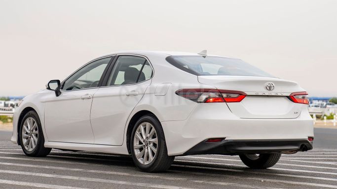 Used Toyota Camry IX (XV80), 2.5 l, 2024 in Dubai by Milele, White color. Other | AUTO.AE