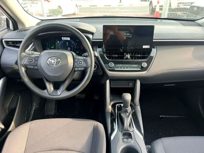 New Toyota Corolla Cross I, 2.0 l, 2020 in Dubai by ANDIAMO MOTORS FZE, White color. Chinese Specs | AUTO.AE