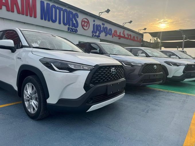 New Toyota Corolla Cross I, 2.0 l, 2025 in Dubai by Mohamed Hakim Motors, White color. Chinese Specs | AUTO.AE
