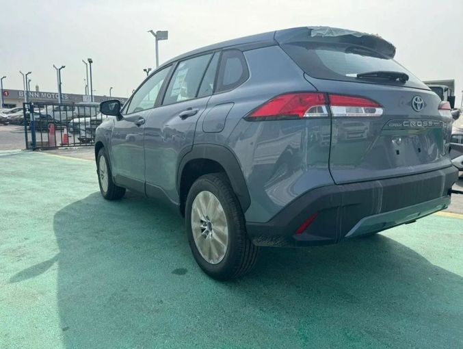 New Toyota Corolla Cross I, 1.8 l, 2024 in Dubai by Mohamed Hakim Motors, Blue color. GCC Specs | AUTO.AE