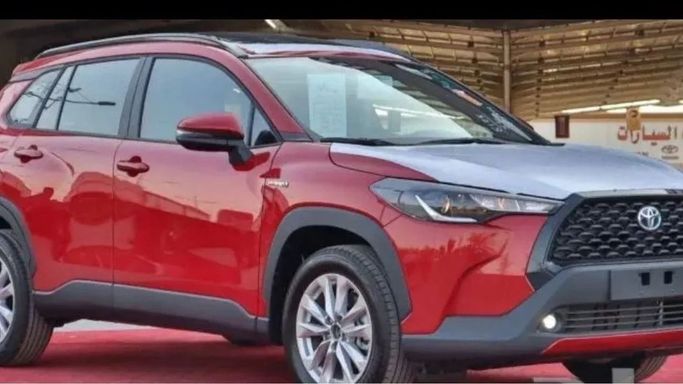 New Toyota Corolla Cross I, 1.8 l, 2024 in Dubai by Mohamed Hakim Motors, Red color. GCC Specs | AUTO.AE