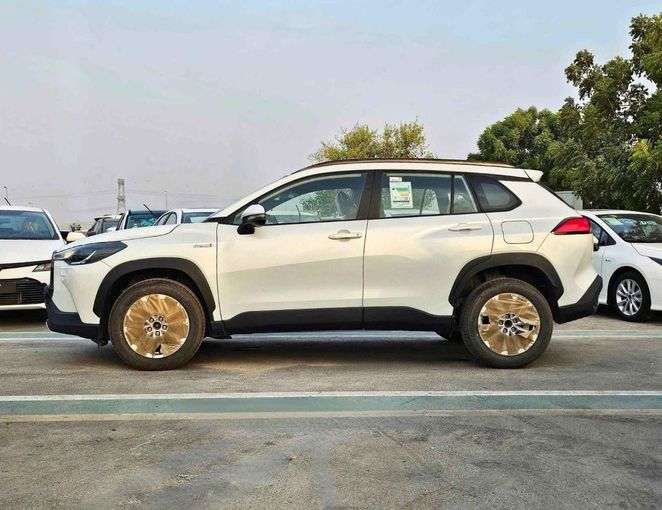 New Toyota Corolla Cross I, 1.8 l, 2024 in Dubai by SK Motors, White color. GCC Specs | AUTO.AE