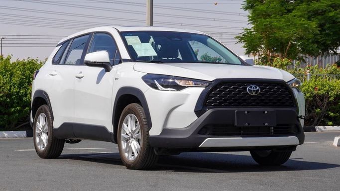 New Toyota Corolla Cross I, 2.0 l, 2025 in Dubai by Najem Motors, White color. Chinese Specs | AUTO.AE