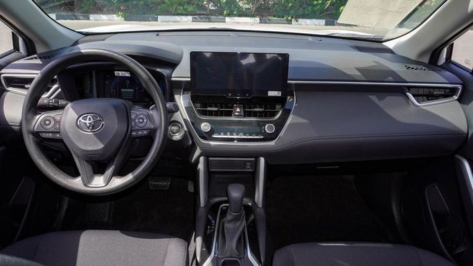 New Toyota Corolla Cross I, 2.0 l, 2025 in Dubai by Najem Motors, White color. Chinese Specs | AUTO.AE