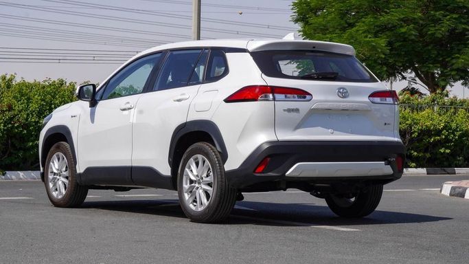 New Toyota Corolla Cross I, 2.0 l, 2025 in Dubai by Najem Motors, White color. Chinese Specs | AUTO.AE