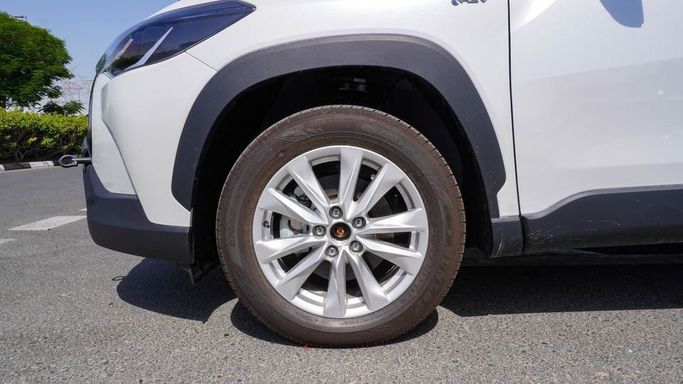 New Toyota Corolla Cross I, 2.0 l, 2025 in Dubai by Najem Motors, White color. Chinese Specs | AUTO.AE