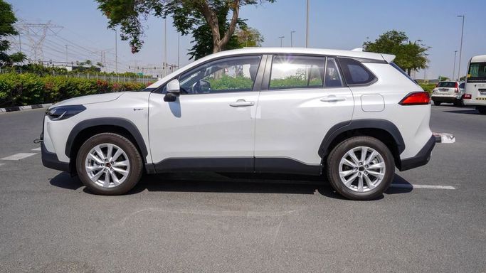 New Toyota Corolla Cross I, 2.0 l, 2025 in Dubai by Najem Motors, White color. Chinese Specs | AUTO.AE