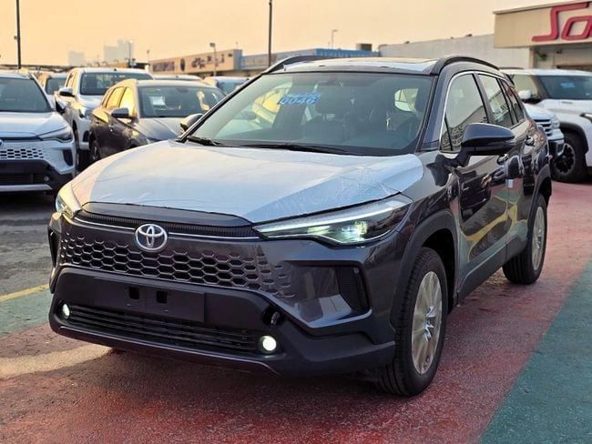 New Toyota Corolla Cross I, 1.8 l, 2025 in Dubai by Soltan Auto, Grey color. GCC Specs | AUTO.AE