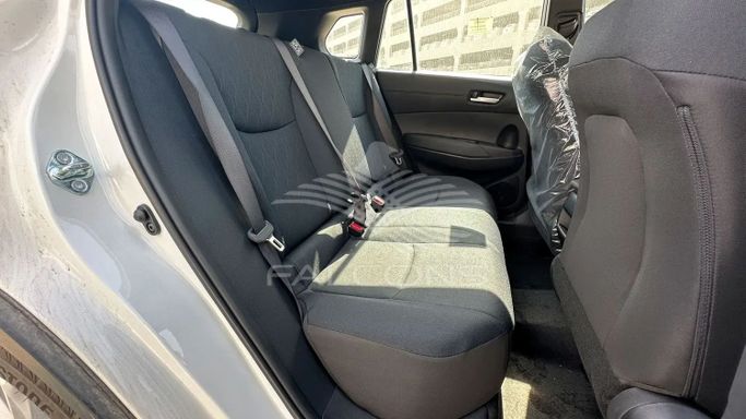 New Toyota Corolla Cross I, 1.8 l, 2025 in Dubai by Falcons GT Motors FZCO, White color. Other | AUTO.AE