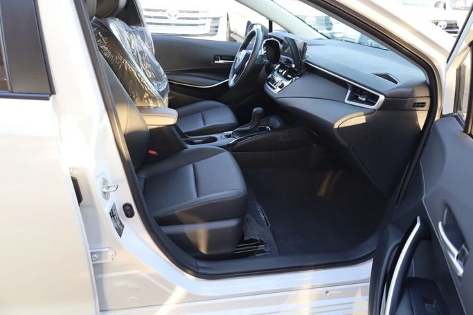 Новый Toyota Corolla Sporty XII (E210) Рестайлинг, 1.8 л, 2025 в Дубае от JES Motors Белый цвет.  | AUTO.AE