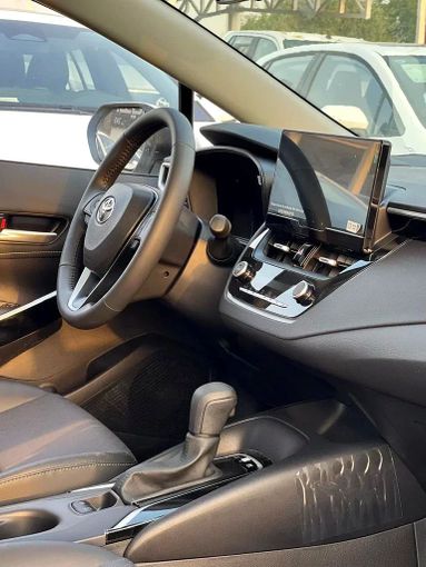Новый Toyota Corolla Sporty XII (E210) Рестайлинг, 1.8 л, 2023 в Дубае от ANDIAMO MOTORS FZE Белый цвет. Китайская | AUTO.AE