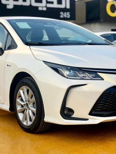 Новый Toyota Corolla Sporty XII (E210) Рестайлинг, 1.8 л, 2023 в Дубае от ANDIAMO MOTORS FZE Белый цвет. Китайская | AUTO.AE