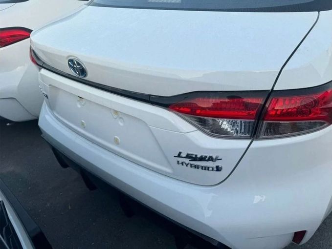 New Toyota Corolla Sporty XII (E210) Facelift, 1.8 l, 2025 in Dubai by Mohamed Hakim Motors, White color. Chinese Specs | AUTO.AE