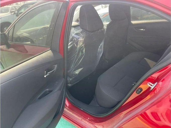 New Toyota Corolla XII (E210), 1.6 l, 2023 in Dubai by Mohamed Hakim Motors, Red color. Other | AUTO.AE