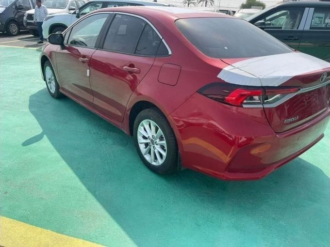 New Toyota Corolla XII (E210), 1.6 l, 2023 in Dubai by Mohamed Hakim Motors, Red color. Other | AUTO.AE