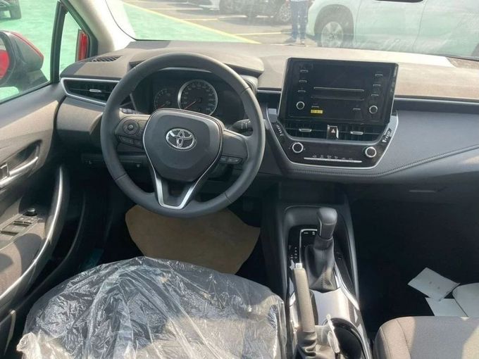 New Toyota Corolla XII (E210), 1.6 l, 2023 in Dubai by Mohamed Hakim Motors, Red color. Other | AUTO.AE