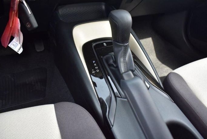 New Toyota Corolla Sporty XII (E210), 2.0 l, 2023 in Dubai by Mohamed Hakim Motors, White color. GCC Specs | AUTO.AE